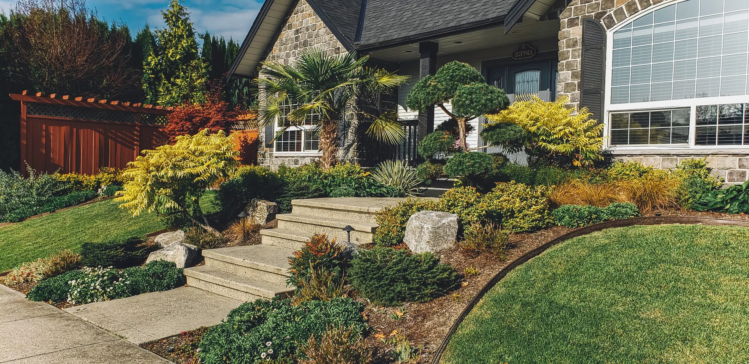 A finished landscaping job at a house, built by a Rega client