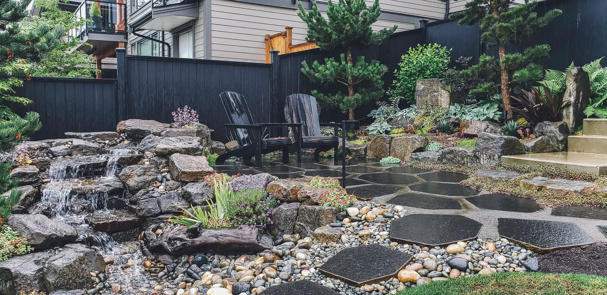 A finished landscaping and hardscape project built by a Rega client