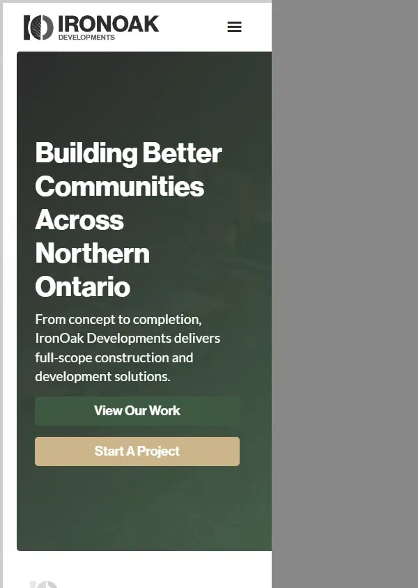 The IronOak Developments website on a phone
